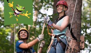 Young Woman on Zipline With Staff Member